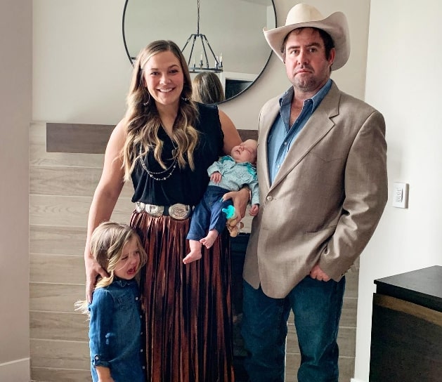 Image of Emily Wears with her husband, Cody Kroul, and their daughters