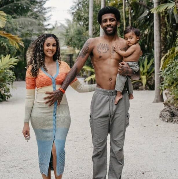 Image of Kyrie Irving and his wife, Marlene Wilkerson, with their son