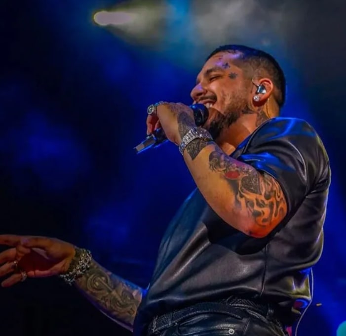 image of Christian Nodal's sleeves and arms tattoos