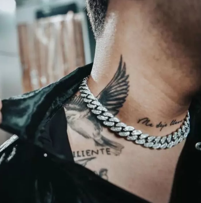 Image of Christian Nodal's neck tattoos
